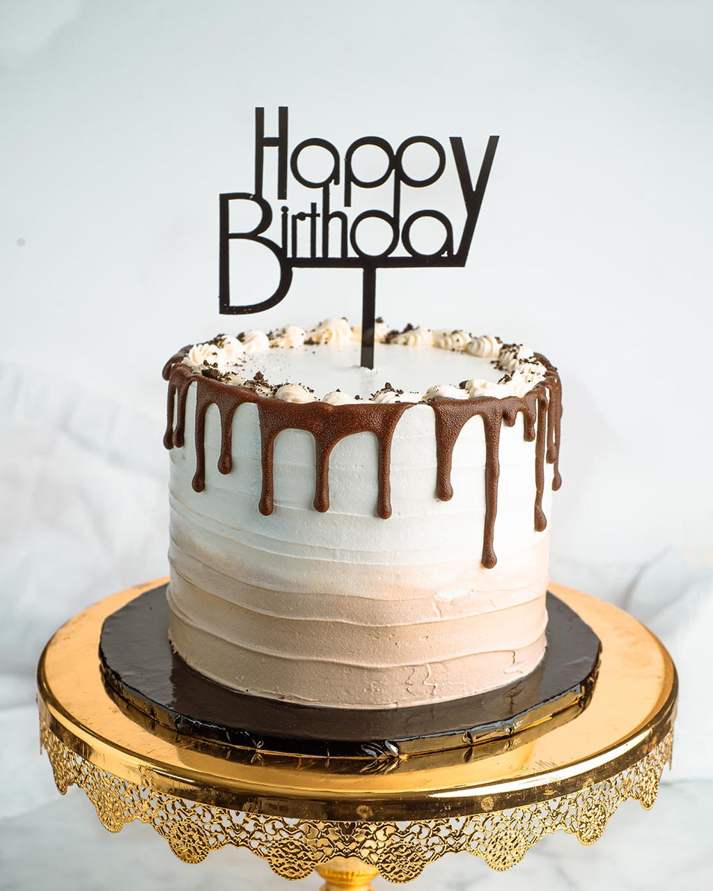 The Brown and Drips Cake image 0